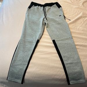 An RBX grey and black sweatpants in a size small.